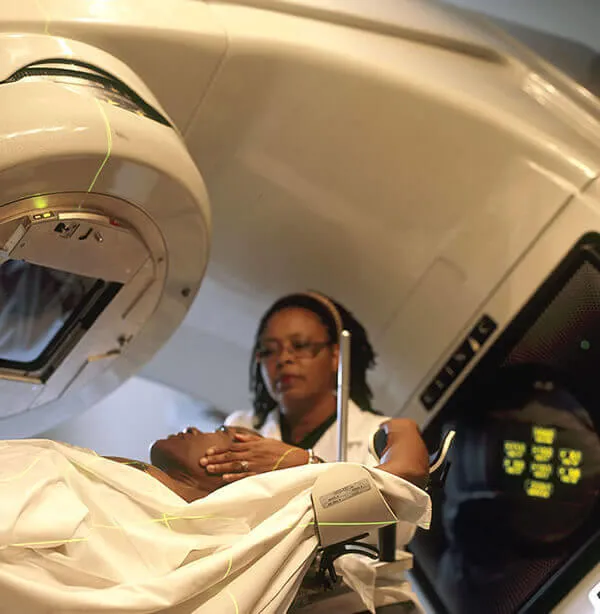 Woman prepared for radiation therapy